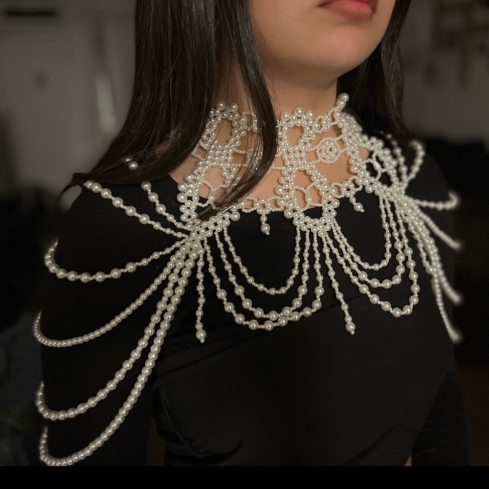 Beaded shoulder piece